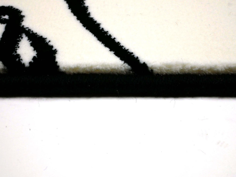 modern vloerkleed wit zwart heringi detail