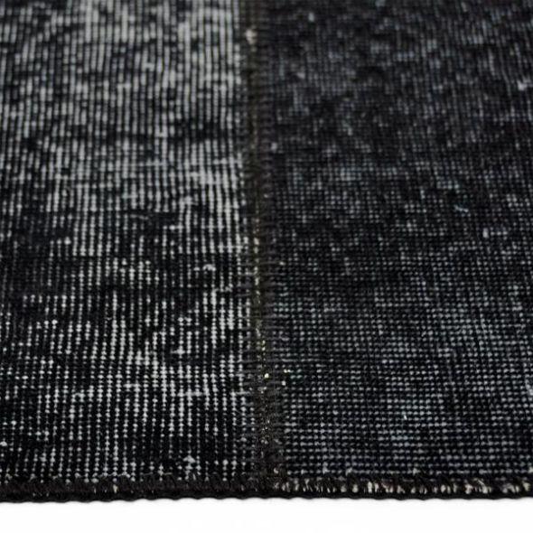 zwart vloerkleed patchwork balaclava zijkant